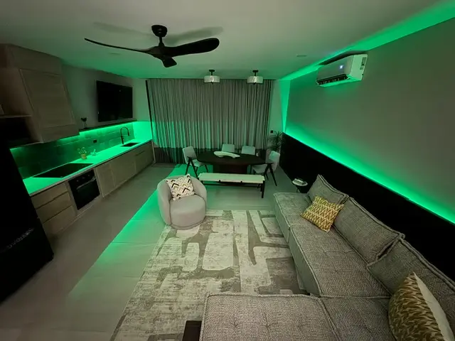 3 Bedroom Ocean View Sunset Villas 21 a living room with green lights